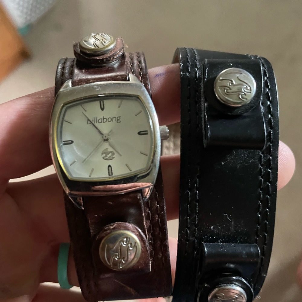 Billabong watch. Needs new battery. With brown and black band